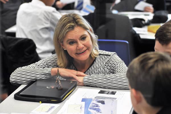 Justine Greening MP,  then-Secretary of State for Education, chats to pupils at Oakwood School on the day of its official reopening.