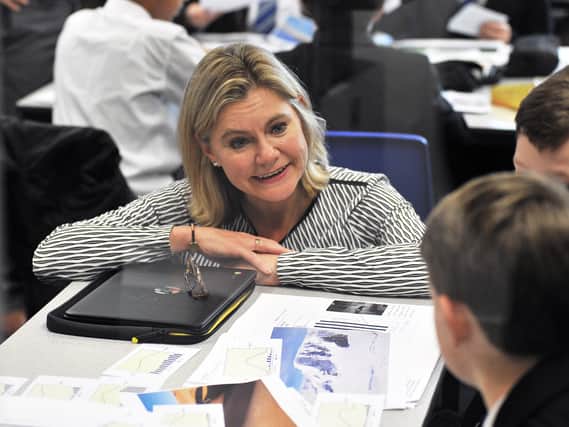 Justine Greening MP,  then-Secretary of State for Education, chats to pupils at Oakwood School on the day of its official reopening.