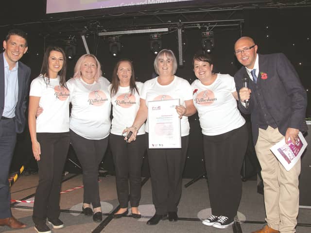 The winning team with deputy director Chris Holt (left) and radio DJ Dixie from Heart FM