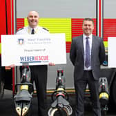 West Yorkshire chief fire officer John Roberts, Richard Wood from Weber UK and James Courtney.