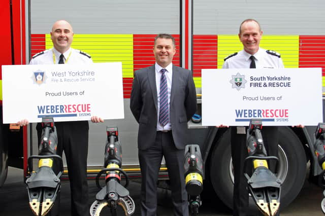 West Yorkshire chief fire officer John Roberts, Richard Wood from Weber UK and James Courtney.