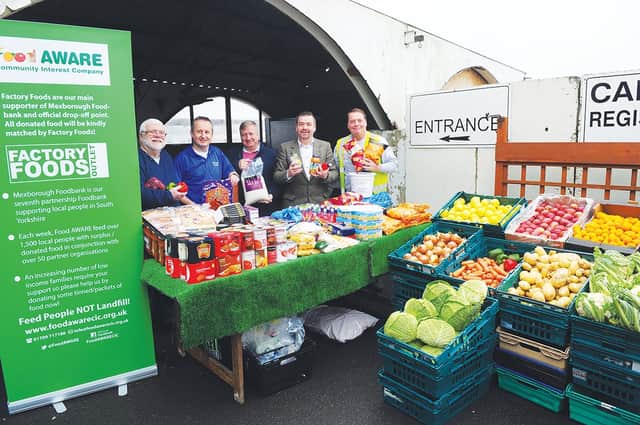 Pictured are (from left to right), supporter, Bruce Gillham, Factory Foods M/D, Steve Percival, Mexborough Children's Centre manager, Ken Guest, Food Aware M/D, Shaun Gibbons and food bank co-ordinator, Mark Docherty. 142139-1