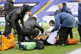 Joe Mattock is injured at Coventry City