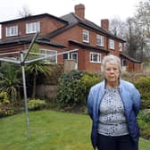 Wendy Stead in her garden which is at the side of 122/24 Wickersley Road which will be demolished to provide access to the site. 210168-6