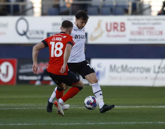 Ollie Rathbone in first-half action against Luton. Picture by Jim Brailsford