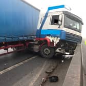The lorry jack-knifed and crashed into the central reservation.