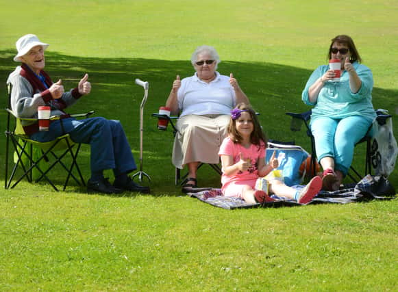 Enjoying a picnic in the sunshine at Clifton Park last year were Amy Morton, her grandmother Jaqui Morton (right) and great grandparents Raymond and Sylvia Rhodes. 161395-1