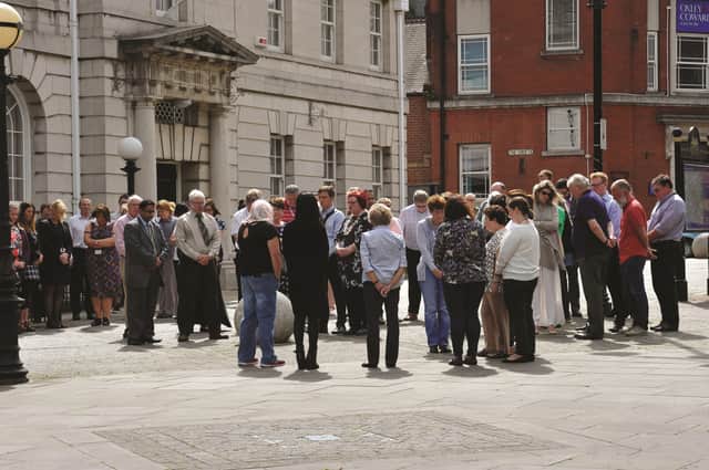 A minute's silence was held outside Rotherham Town Hall this morning (Tuesday)
