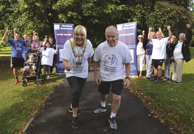 The Mayor of Rotherham Cllr Eve Rose Keenan who is running a mile a day for Headway, was joined by marathon man Ray Matthews for her first stint in Rosehill Park. Cheering them on were Headway representatives, fundraisers and supporters. 171401-2