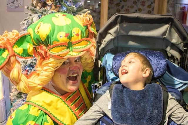Damian with Adam Salt, who has quadriplegic cerebral palsy, chronic lung disease and uncontrolled epilepsy after being born at 32 weeks