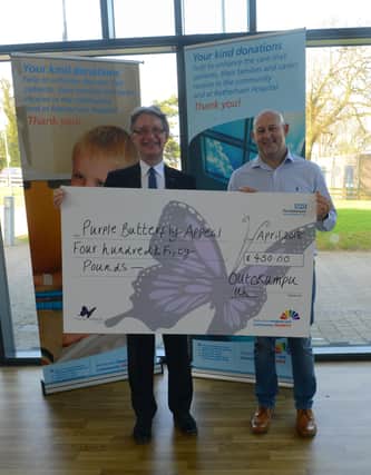 Outokumpu Stainless employee Philip Bray (right) with Barry Mellor, chair of the charitable funds committee.