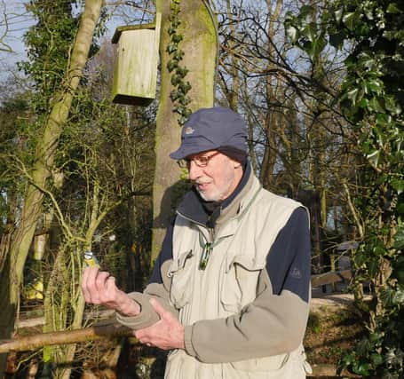 Chris Lilley of Sorby Breck Ringing Group, with blue tit at the Tropical Butterfly House