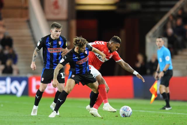 Joe Mattock tussles with Britt Assombalonga