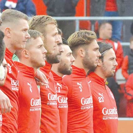 Will Vaulks and teammates observe a minute's silence