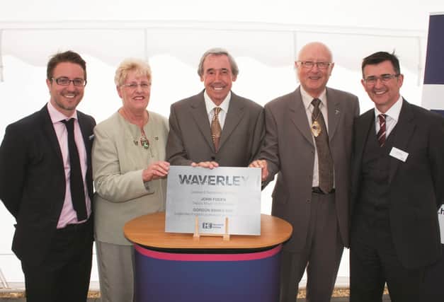 Gordon Banks (centre) officially launching the first phase of housing at Waverley in 2012