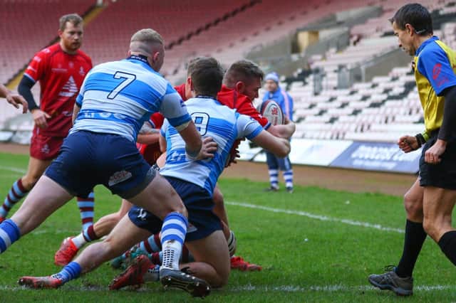 Zak Poole goes over for one of Rotherham's five tries at Darlington last Saturday.
