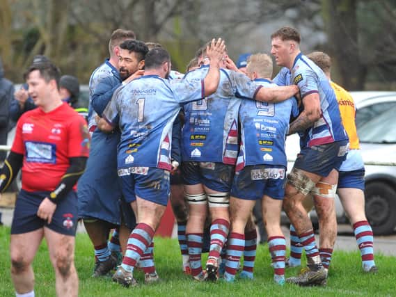 Rotherham Titans celebrate their opening try in Saturday's win over Hull Ionians.