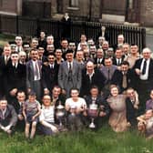 Rawmarsh Welfare players and supporters outside the Horse and Jockey  pub in 1950 with the Mexborough Montagu Cup and the Rotherham Charity Cup