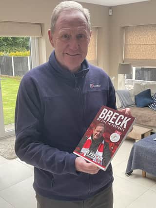 John Breckin with his new book