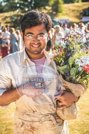 Rahul lifting the GBBO trophy a year after his Rotherham Show win