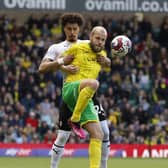 No way through ... Cameron Humphreys sees off Teemu Pukki. Pictures by Jim Brailsford