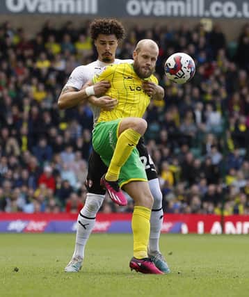 No way through ... Cameron Humphreys sees off Teemu Pukki. Pictures by Jim Brailsford