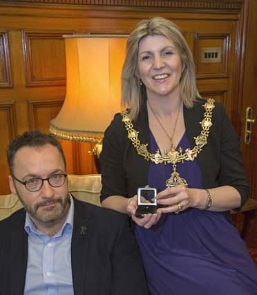 The Mayor of Rotherham, Cllr Lyndsay Pitchley, with businessman Darren Hughes and the diamond he donated