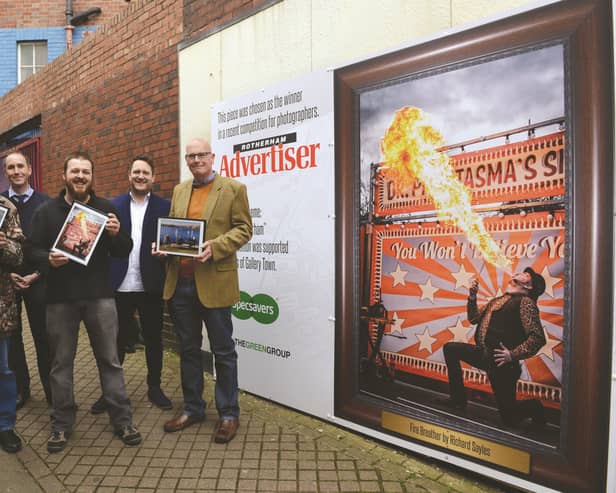 The winning image in the Rotherham Advertiser photography competition titled 'Fire Breather' was unveiled at College Walk recently as part of Rotherham's Gallery Town. Advertiser editor Andrew Mosley (second left) and Gallery Town project manager Ged Jenkins-Omar (second right) are pictured with winners (from left to right): Lee Evans (third place), Richard Sayles (first place) and Nigel Toohey. 170714-1