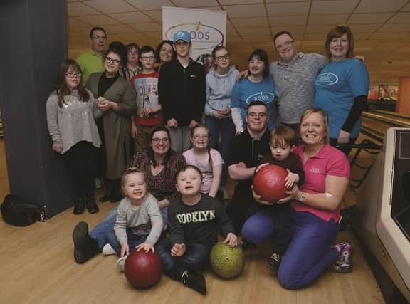 Group members at their bowling party last February
