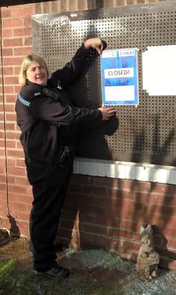 PC Lisa Ainsworth issues the closure order