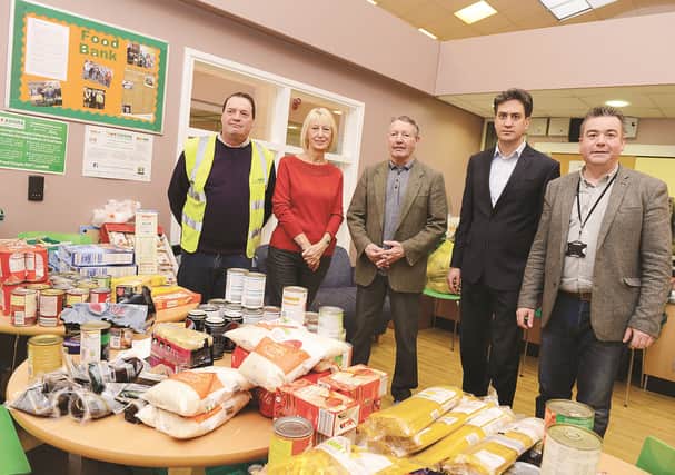 MP Ed Miliband visited the Mexborough foodbank recently. He is seen with (from left to right): Food Aware project co-ordinator Mark Dockerty, foodbank volunteer Pat Johnson, charity supporter Tommy Joyce and foodbank manager Sean Gibbons. 180127-1