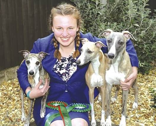 Top dogs-Sophie Mitchell with her dogs (from left to right), Luna, Millie and Harry who all made an appearance at Crufts this year. 180463-2