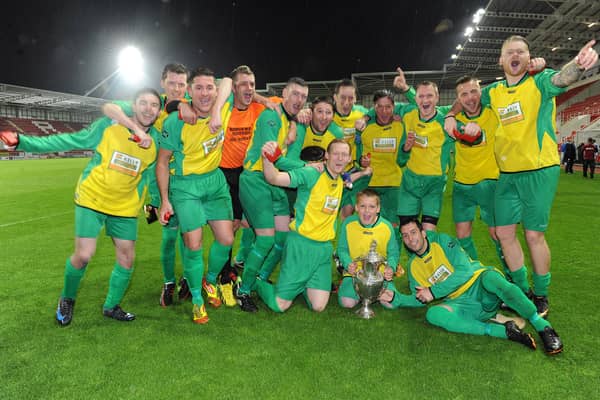 Flashback...Joker celebrate their last Rotherham Charity Cup win in 2013.