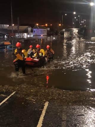 Firefighters have rescued more than 120 people in the county