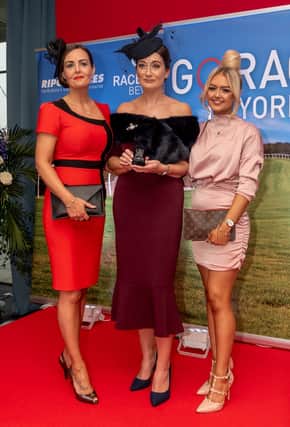 Lisa in York where she was crowned 2019’s best dressed racegoer after winning a regional heat. Lisa is presented with her prize by the judges.