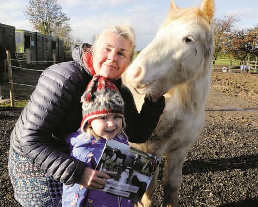 Janine Cope and her grandaughter Clara Robyn Cope with pony, Oscar.