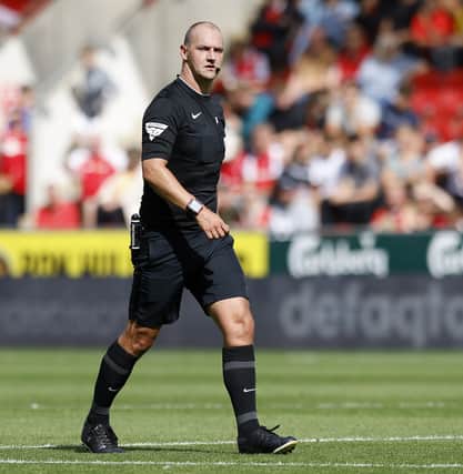 Referee Robert Madley during the Rotherham United v Blackburn Rovers clash. Picture: Jim Brailsford