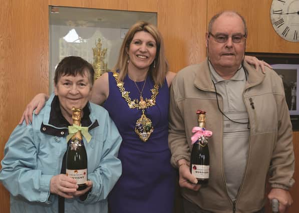 The Mayor of Rotherham Cllr Lyndsay Pitchley pictured with Anne and Brian Pearce of Moorgate, who donated £30,000 to her charities the Alzheimer's Society, The National Autistic Society and Guide Dogs for the Blind.170561