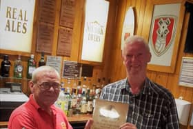 L-R: New York Tavern landlord Chris Brown receives the award from Dr Steve Burns, chairman of Rotherham CAMRA