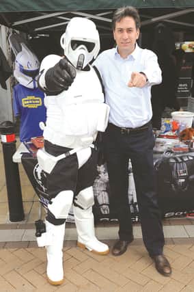 Ed Miliband MP is seen with stormtrooper Mark McFarland, founder of Sentinel Squad UK. 171317-4