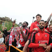 The players on board the victory bus