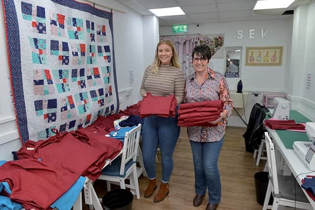 Jayne Maxwell of From Rags to Stitches at Maltby and her daughter Hayley Maxwell with some of the 200 plus scrubs which have been made for health workers by a team of over 60 volunteers.