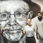 OLIVIA DUNLEAVEY in front of a portrait of the late, great Brendan Ingle with Atif Shafiq and Abdul Ali.