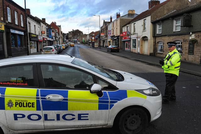 Police at the scene of the raid