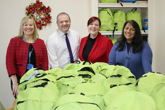 Pictured from left to right: Kathryn Singh, chief executive; Steve Hackett, executive director of finance and performance; Dr Judith Graham, deputy director for organisational development and Rosie Johnson, executive director of workforce and organisational development with some the reverse advent calendar rucksacks.