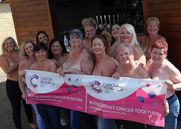 The calendar girls from left to right: co-organiser Kirsty Watts, Lucy Ulley, Claire Hastie, Joanne Hurst, Jo Saddington, Dawn Cousins, Zara Campbell, Joanne Keeling, Jackie Outram, Donna Mitchell, Lisa Wrigley, Ninna Dowell and Jeanie Clarke. Not pictured is co-organiser Suzie Gould.