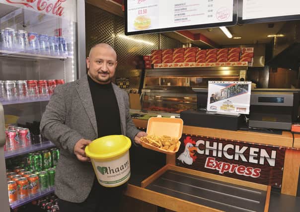 Zaheer Ahmed, owner of Chicken Express, who is feeding the homeless on Tuesday