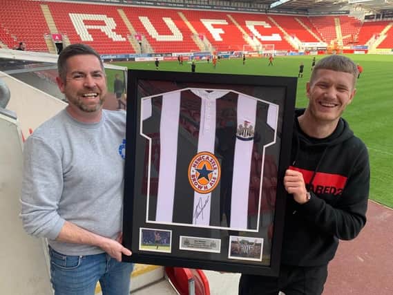 Smudge receives his shirt from the man who did all the organising, Kev Johnson. Many thanks, Kev. Picture by Kerrie Beddows