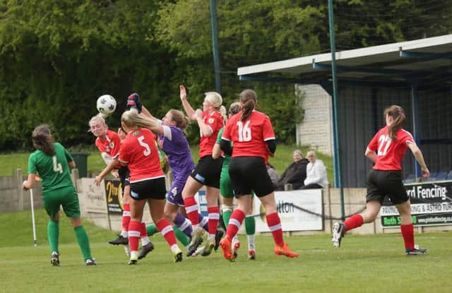 Rotherham United goalkeeper Georgia Ward punches clear in last week's match against Lincoln United. Picture by JULIAN BARKER