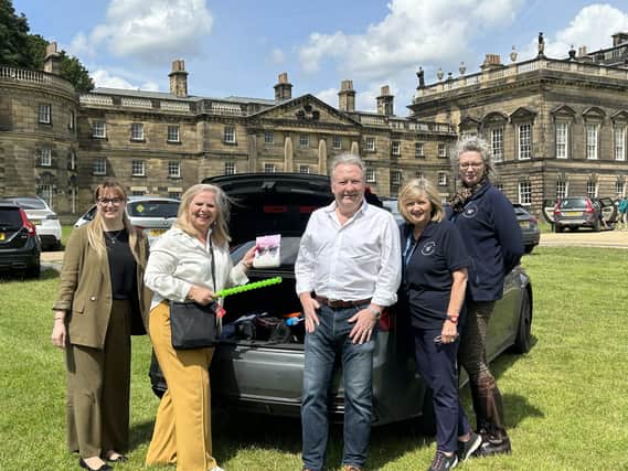 Left to right: Danielle Sheldon, Jill White, Andy Hanselman and WWPT’s Hazel Fields and Alison Constantine get ready for the Bring out your Treasures Car Boot
